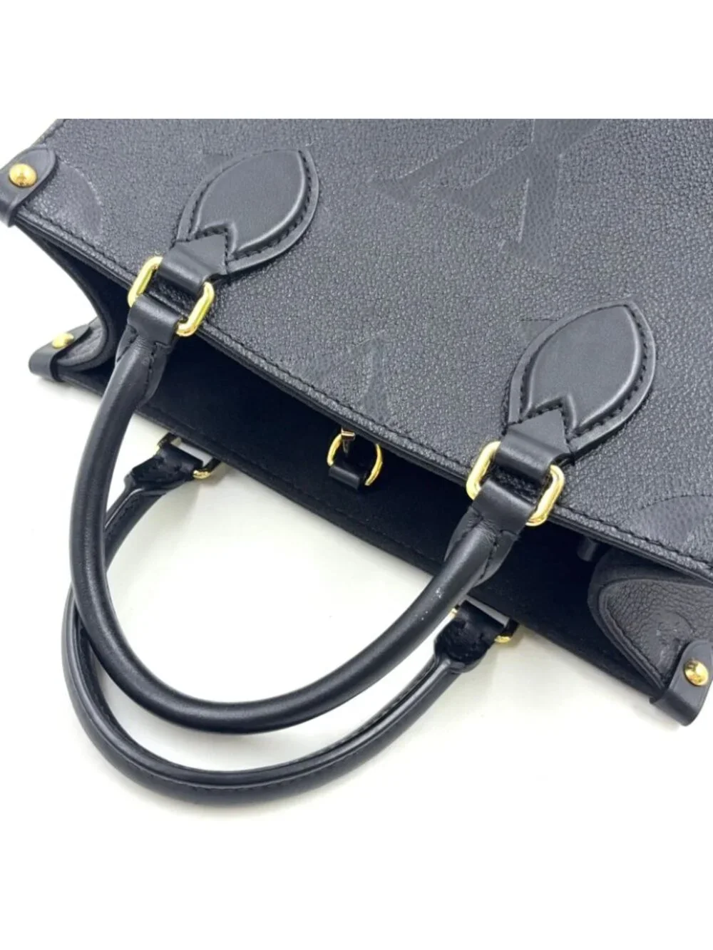 Louis Vuitton On The Go PM Monogram Empreinte Calfskin Black Handbag Gold